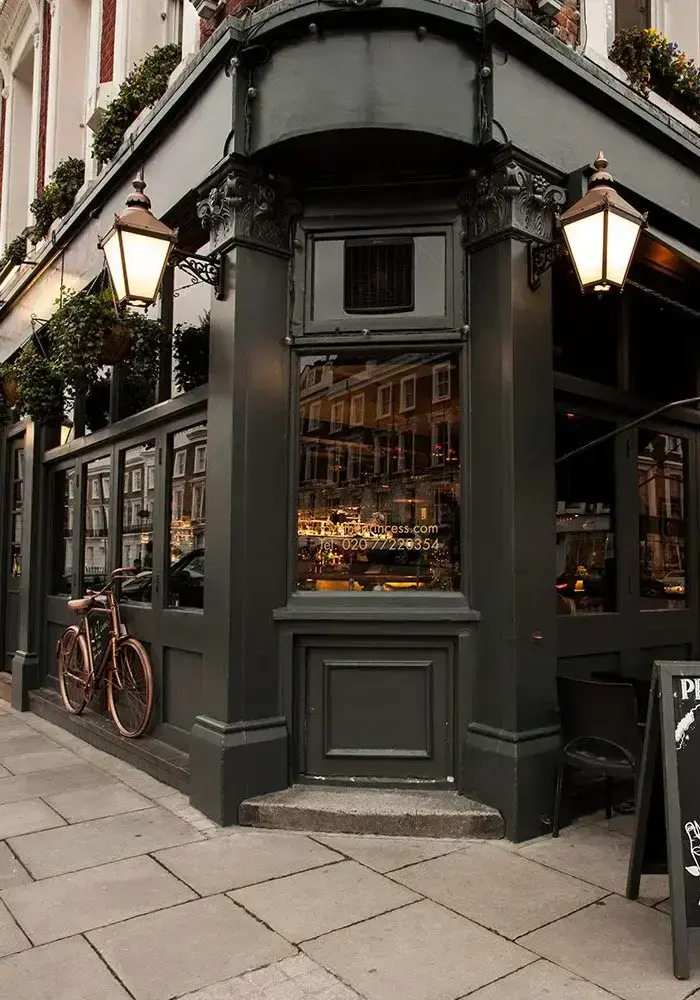 Corner view of a traditional English pub with dark walls